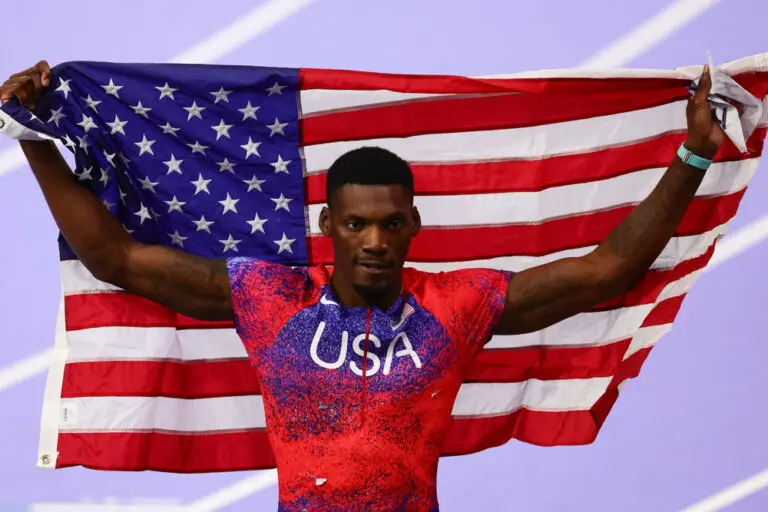 Fred Kerley with the American Flag